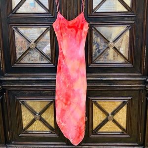 La Belle Asymmetrical-bottom sheer flowy dress.